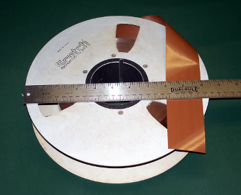 Two-inch magnetic tape on a 10.5-inch reel.