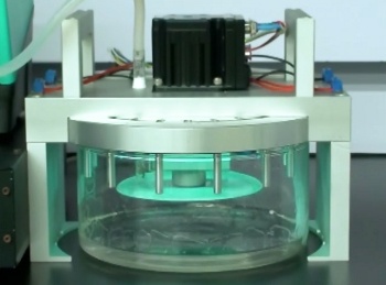 Photocatalytic reactor using a ZnO nanorod catalyst on a spinning compact disk.