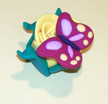 Sculpey sculpture, 'Butterfly on a Flower'