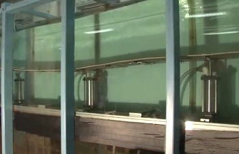 Wave energy converter in a wave tank