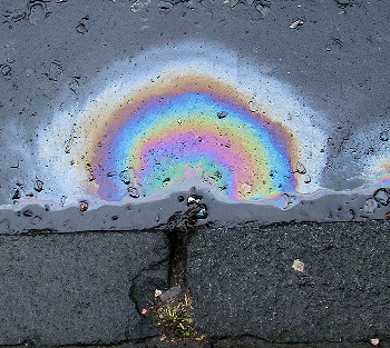 A rainbow interference pattern produced by diesel oil on water