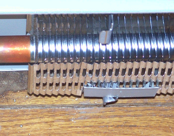 Aluminum fin heat-exchanger in a home hydronic heating system