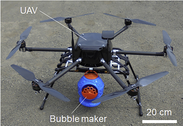 Image of a robotic pollinator consisting of a UAV and a bubble maker.