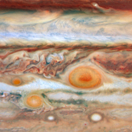 Image of Jupiter's red spot with message embedded as single pixels