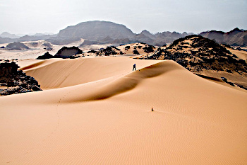 Sand dunes in Tadrart Acacus, a desert area in western Libya, part of the Sahara Desert.  2007 photo by Luca Galuzzi