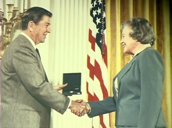 Margaret Burbidge receiving the 1983 National Medal of Science from US President, Ronald Reagan.